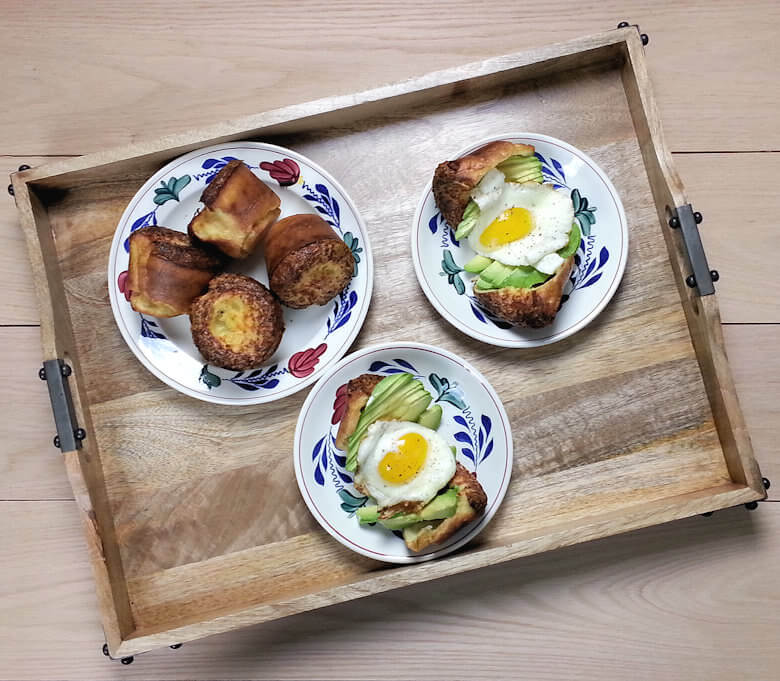 Overhead picture of Cheddar Popover Sandwich with Avocado and Fried Egg